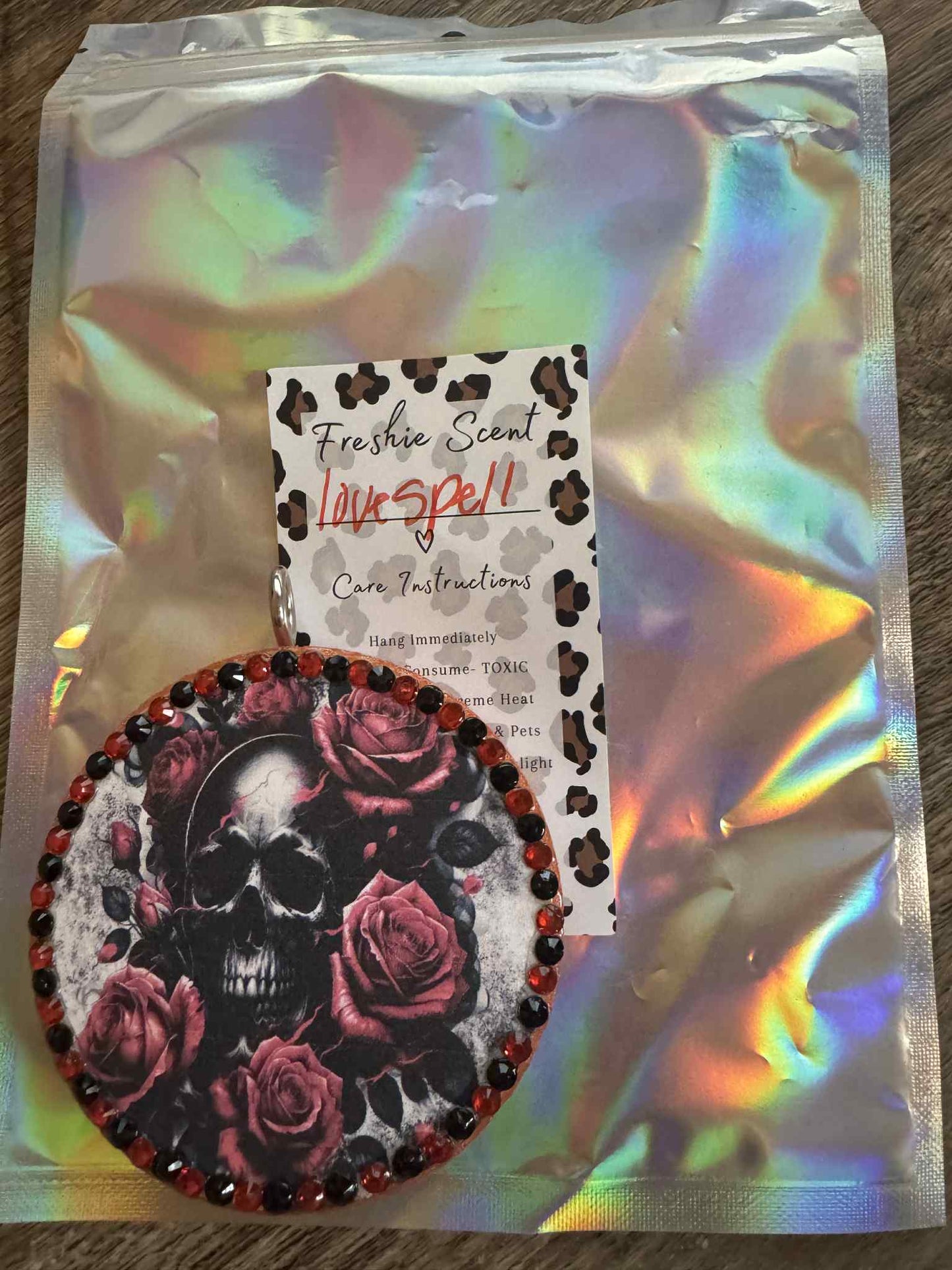 Rhinestoned skull scented Love spell